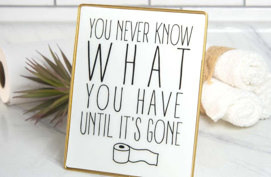 Gold Framed Bathroom Sign on Stand